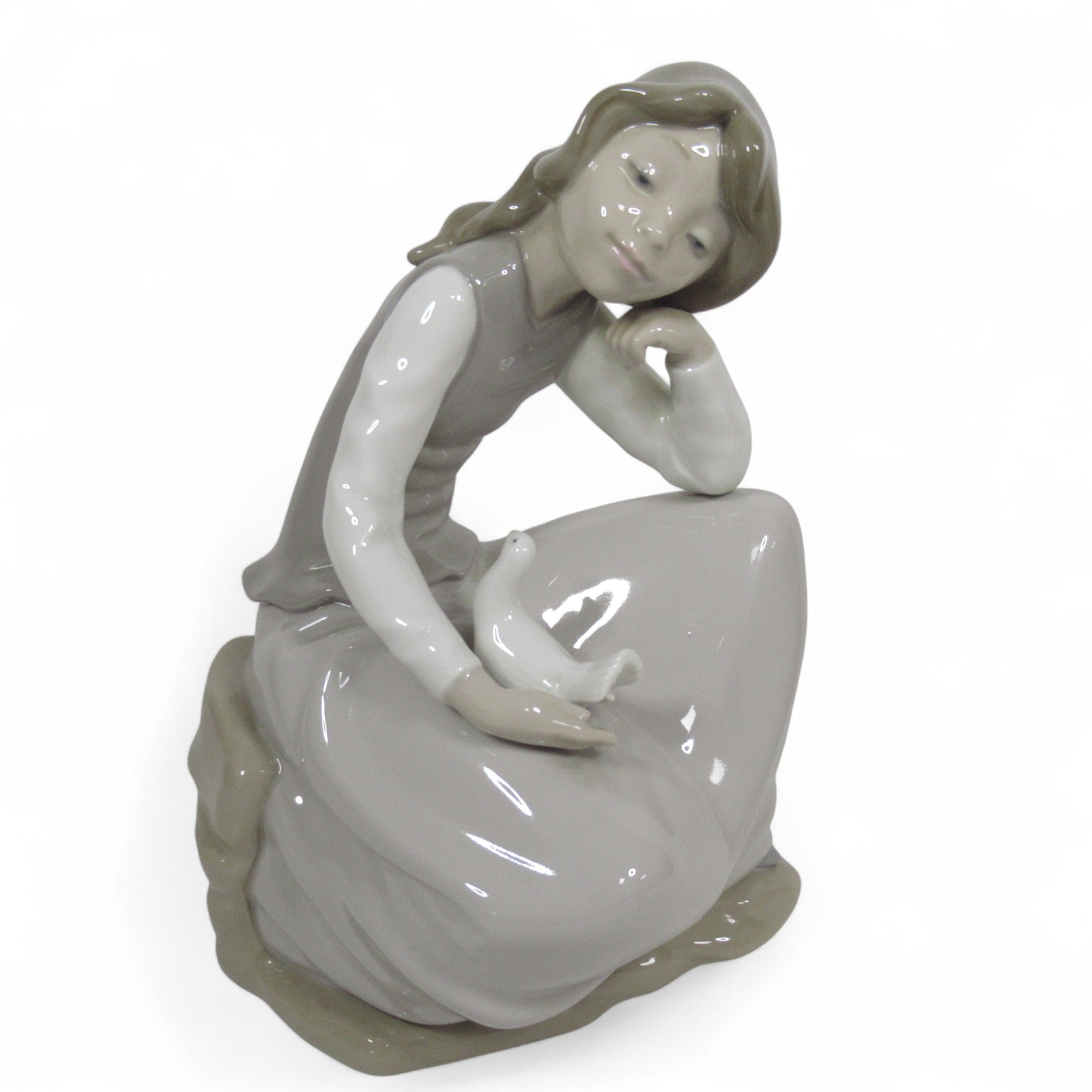 Front image of Nao by Lladro Girl With Dove Figurine 9" Porcelain 1981 