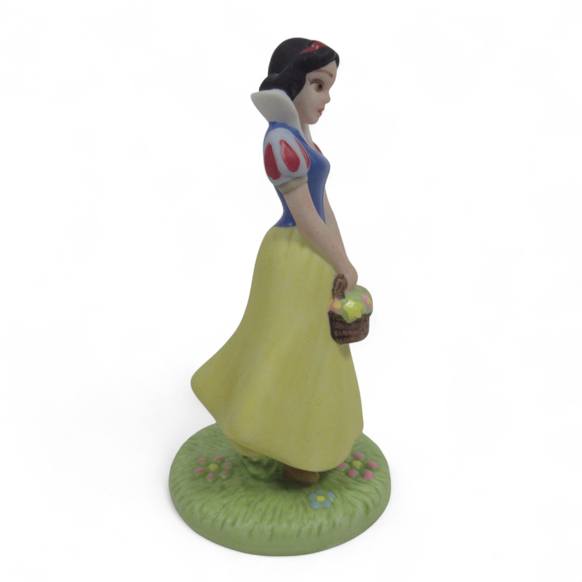 Side image of Disney's Snow White Ceramic/Porcelain Figure By Grolier