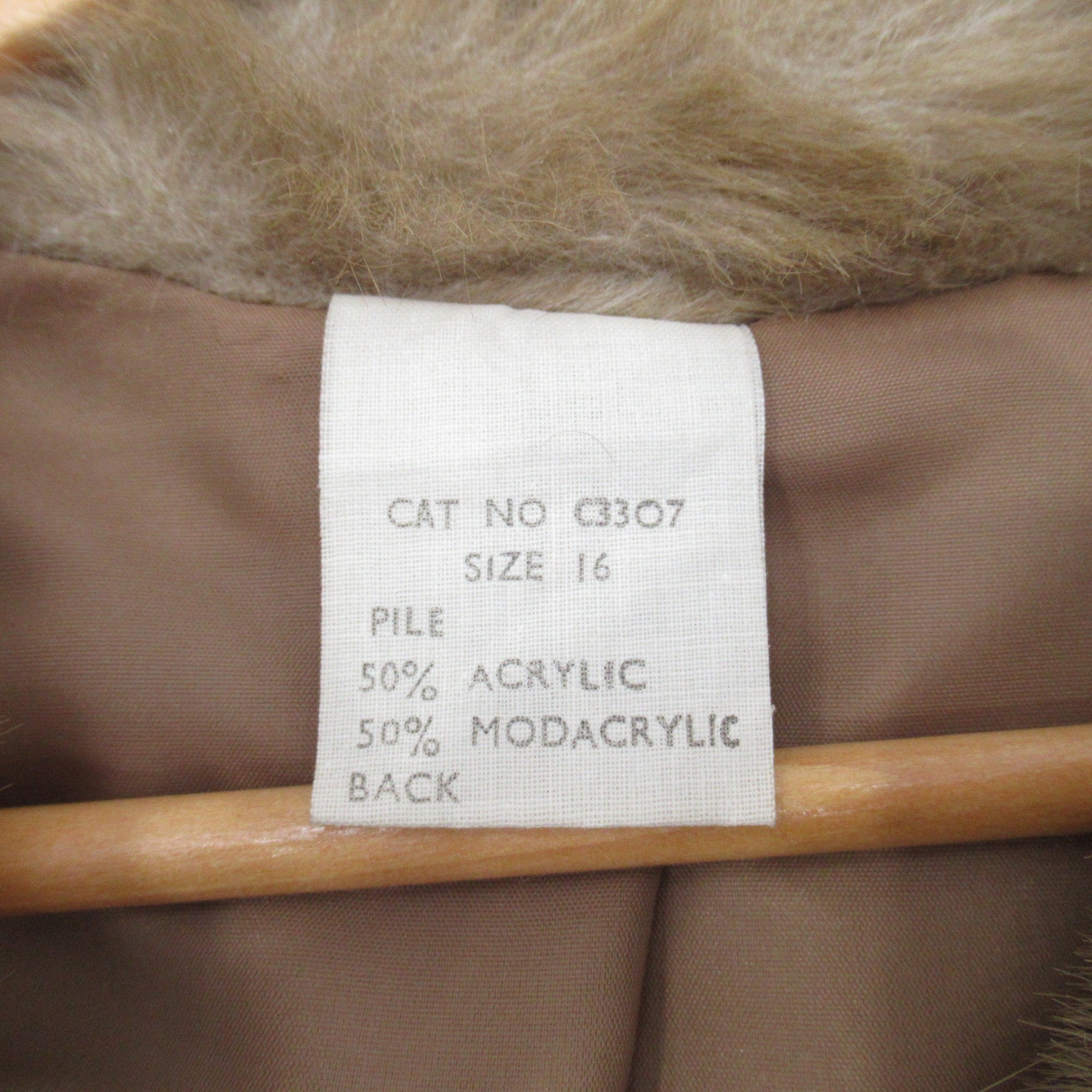 care label image for Astraka Vintage Faux Fur Coat UK 16 Beige Womenswear | Pre-loved