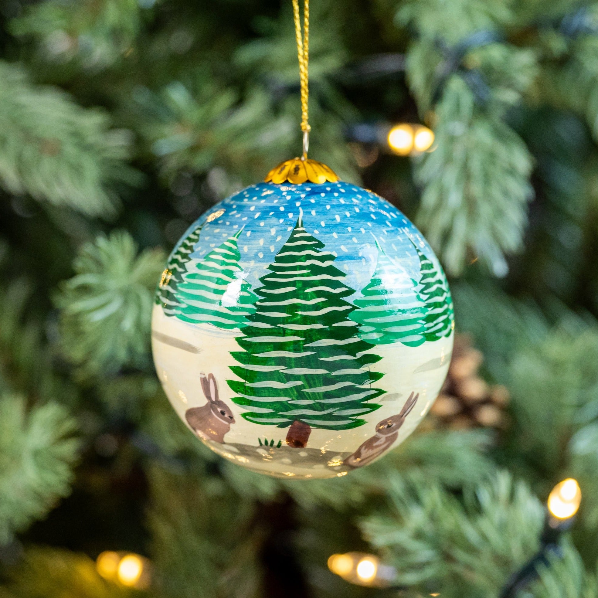 Snow Bunnies Hand Painted Christmas Bauble | British Red Cross Shop