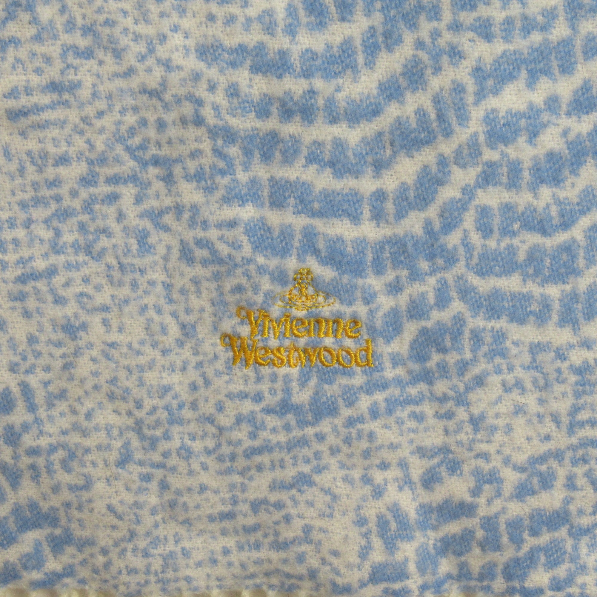 logo image for Vivienne Westwood Knit Scarf Blue Tassel Womenswear | Preloved