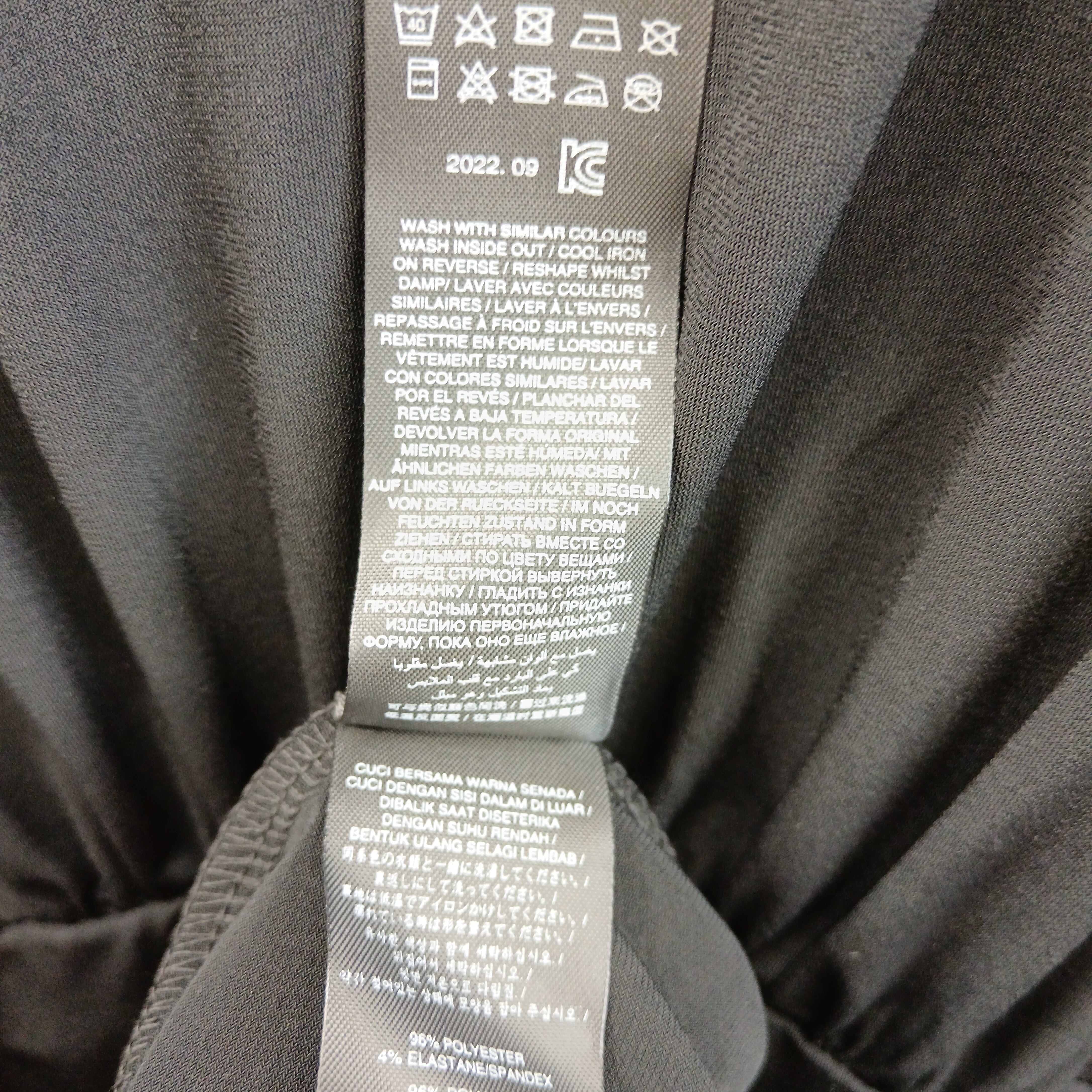 Wash label image for Lipsy London Black Cinched-Waist Jersey Dress UK 22 -Womenswear | Pre-loved