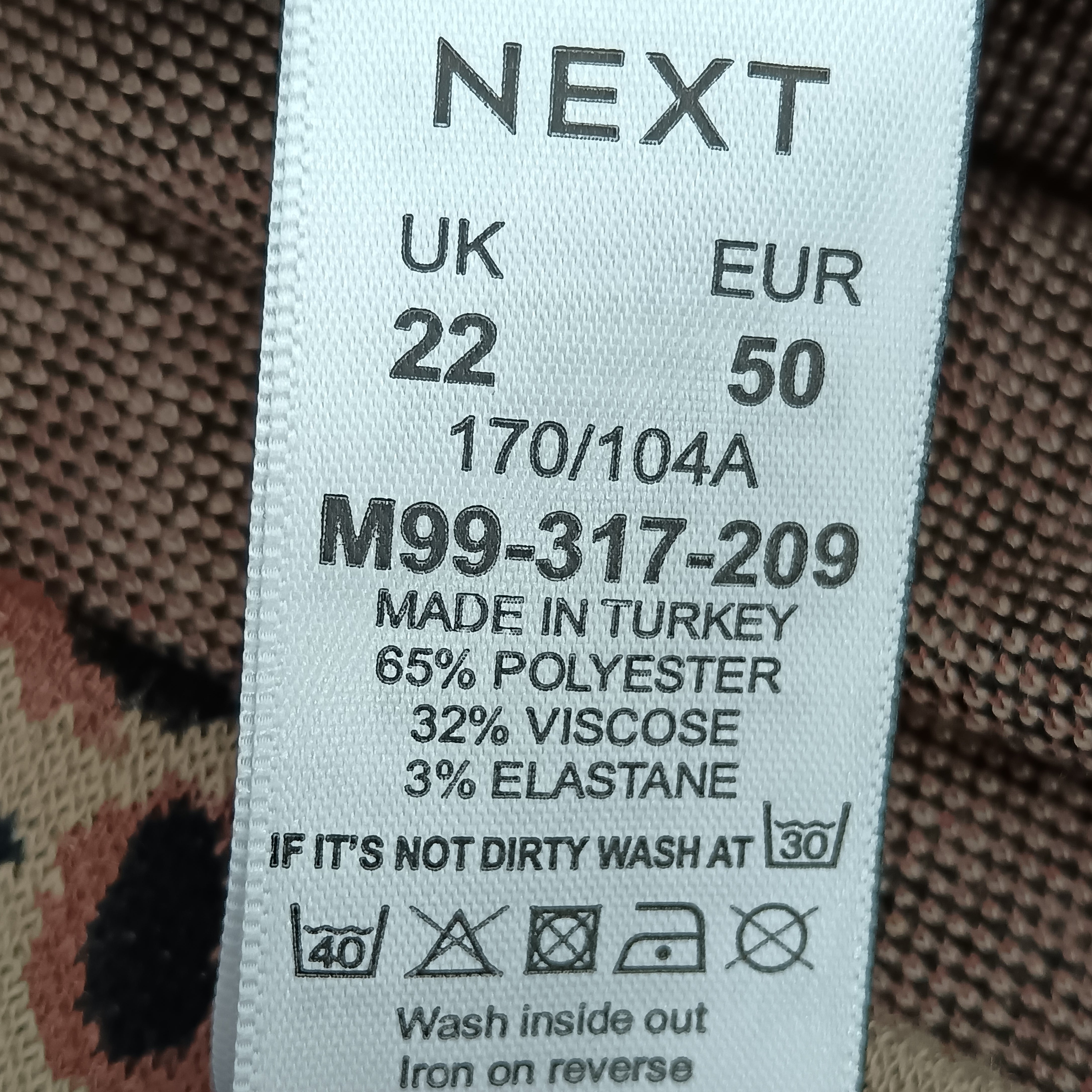 Wash label image for Celia Birtwell for NEXT Ladies  Tan& Black Leopard Print Mini Skirt UK 22  - Womenswear | Pre-loved