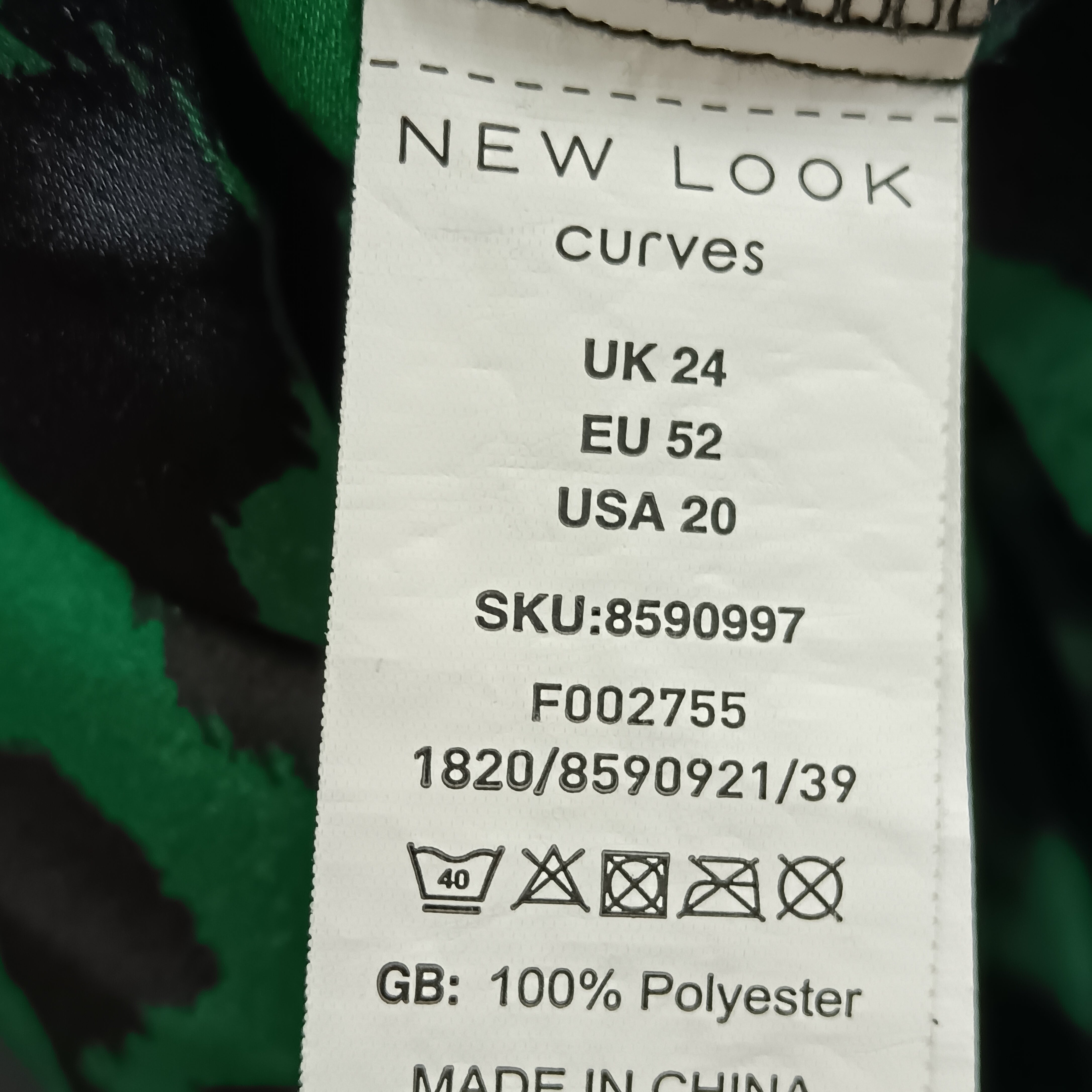 Wash label image for New Look Curves Green Leopard Print Pleated Midi Skirt UK 24 Womenswear | Pre-loved
