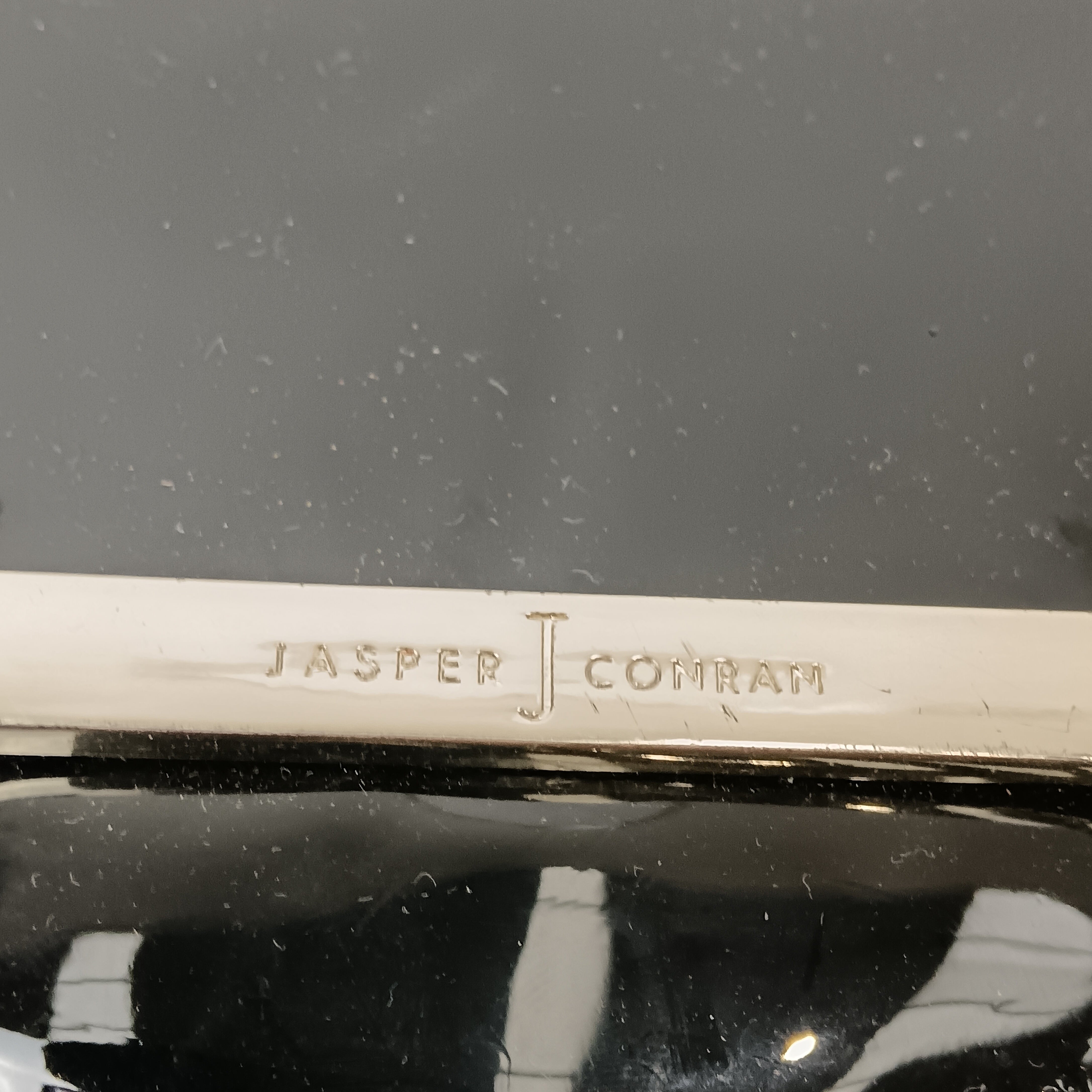 Brand close up image for Jasper Conran Black Patent  Clutch Bag- Womenswear | Pre-loved