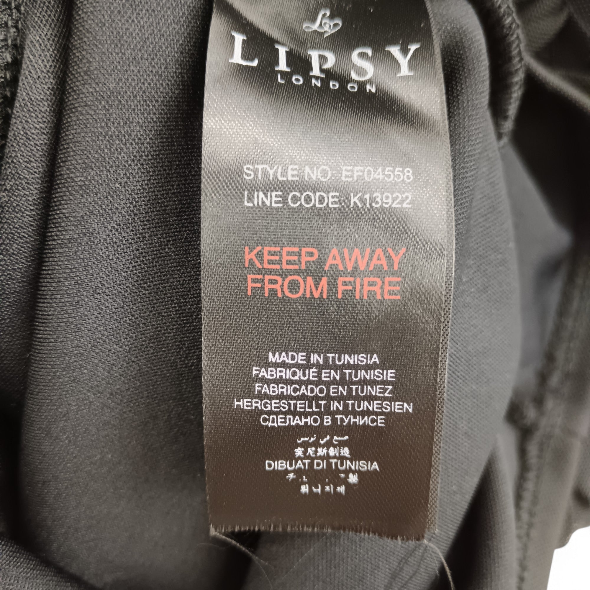 Wash label image for Lipsy Black Strapless Dress UK 10- Tags On- Womenswear | Pre-loved