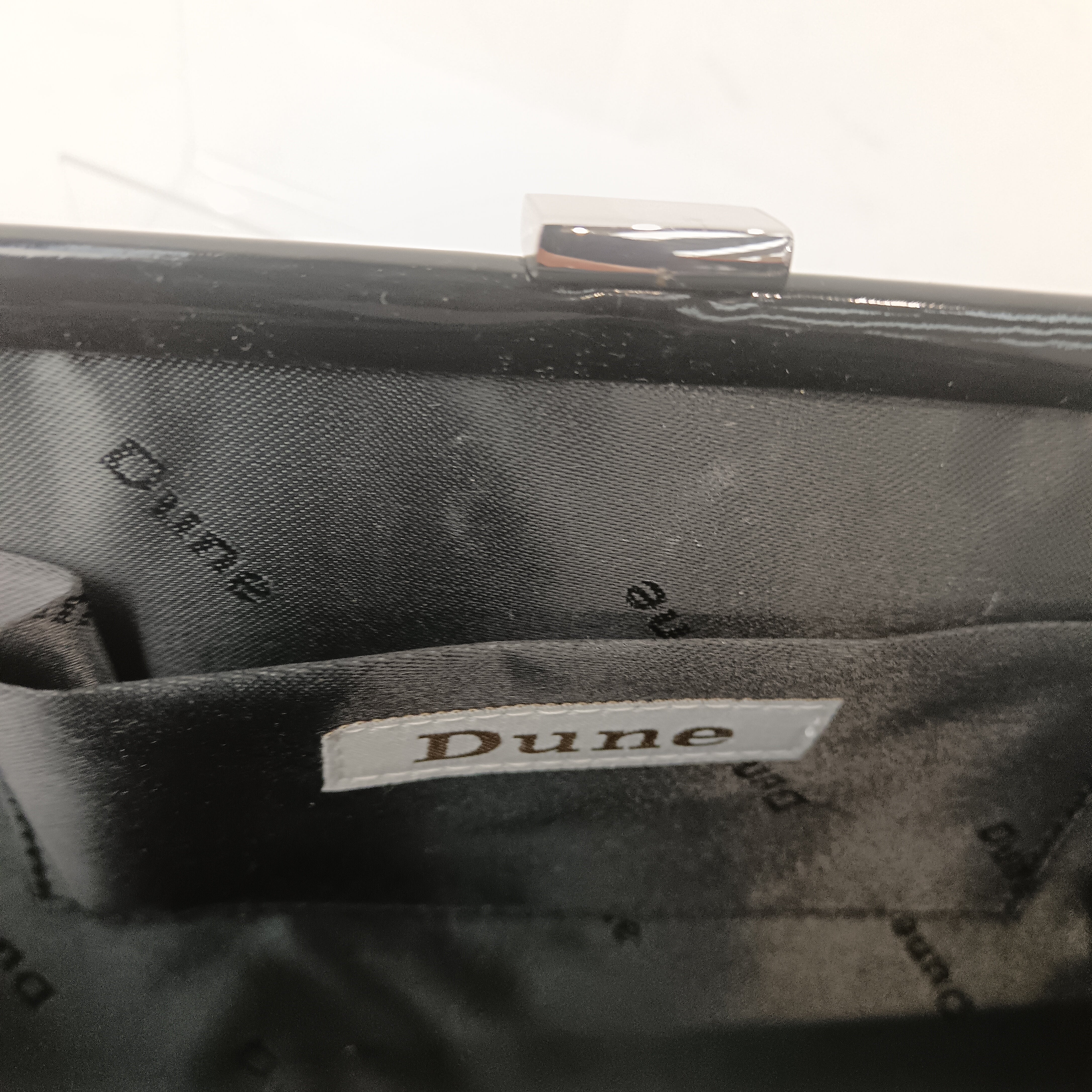 Brand and inside image for Dune Satin Colourful Ladies Clutch Bag Womenswear | Pre-loved