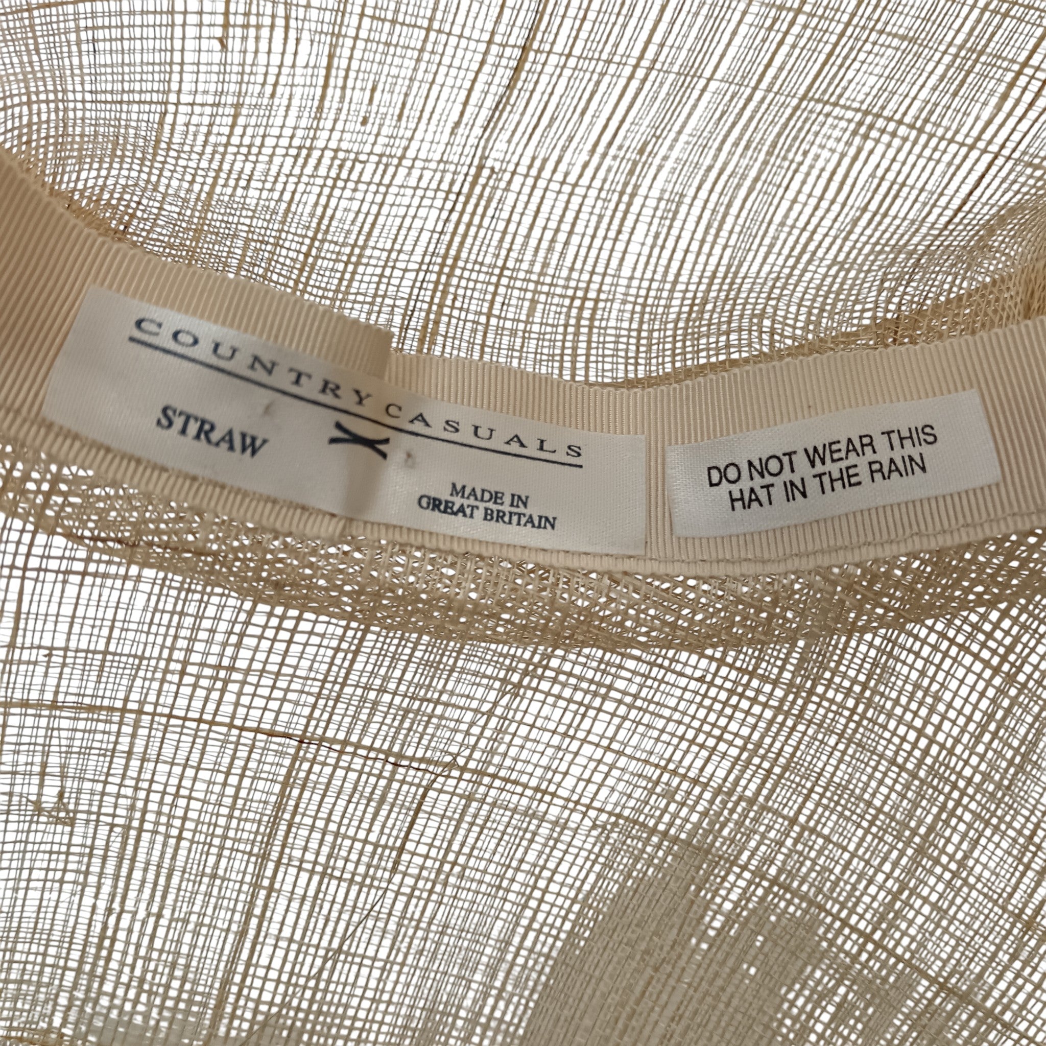 Brand and product info label for Country Casuals Ladies Natural  Special Occasion Wedding Hat Womenswear | Pre-loved