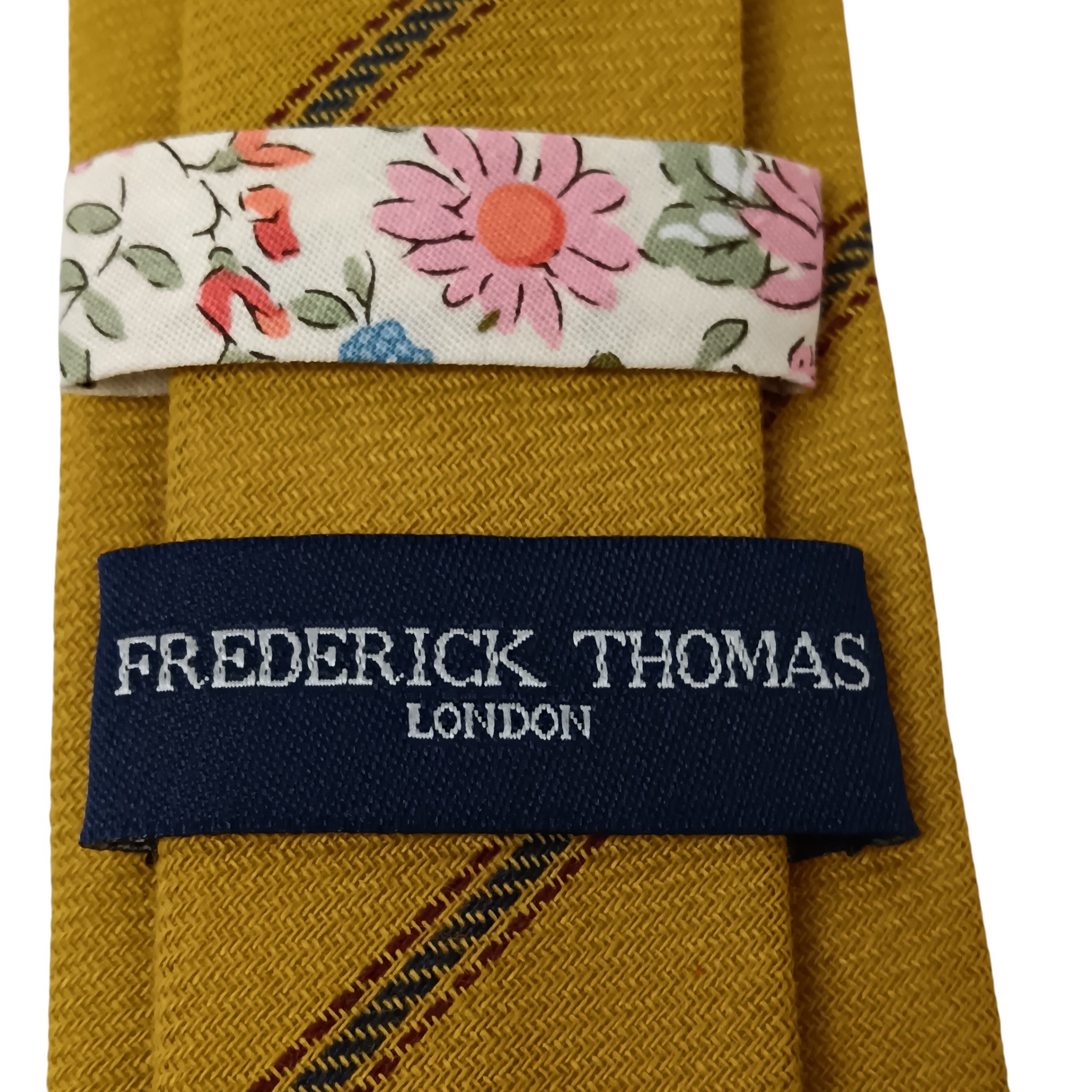 Brand label close up image for Frederick Thomas London Yellow Mustard Strappy Pattern Tie - Menswear | Pre-loved
