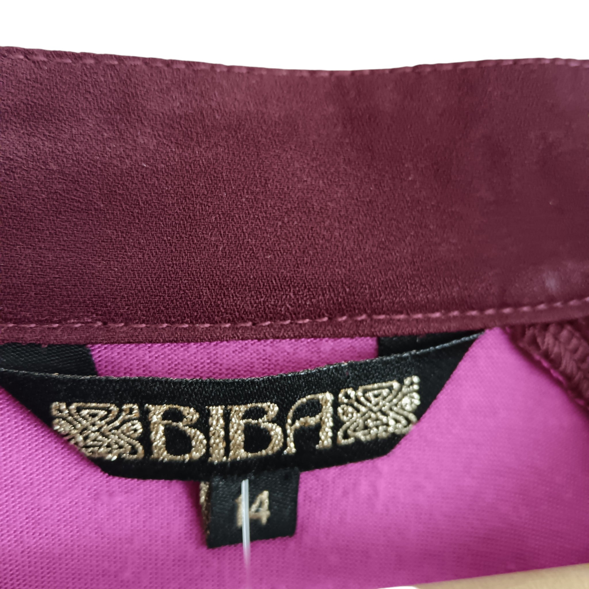 Brand label close up image for Biba Purple / Plum Ladies Sleeved Top UK 14 - Womenswear | Pre-loved