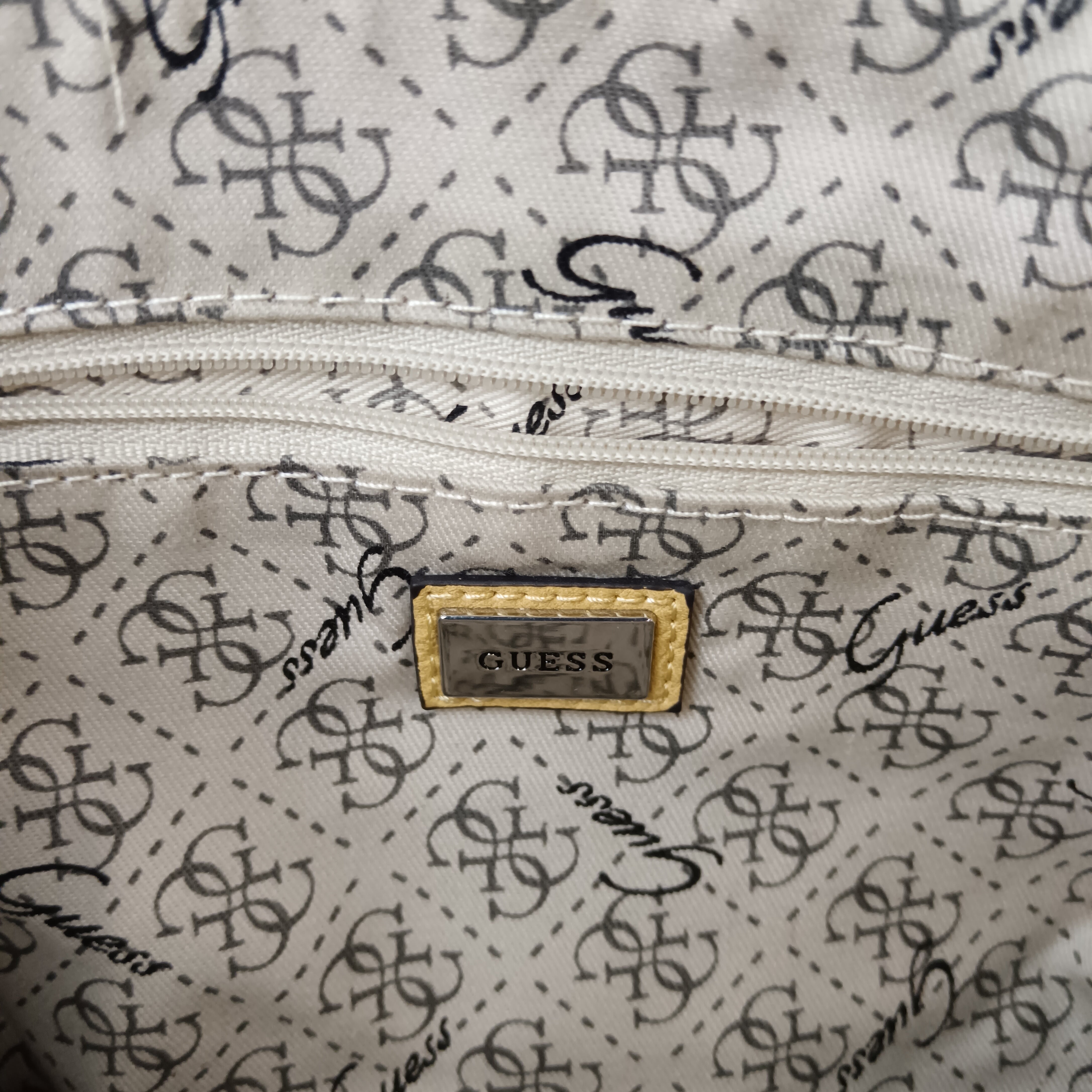 Lining image for Vintage GUESS Yellow Studded  Ladies Clutch Bag- Womenswear | Pre-loved