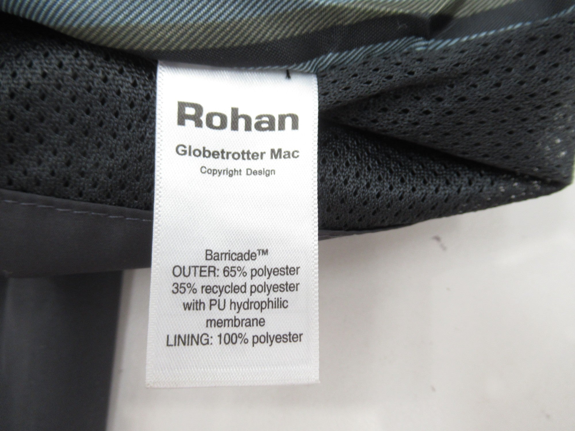 Care label image for Rohan Large Black Waterproof Mackintosh Menswear | Preloved