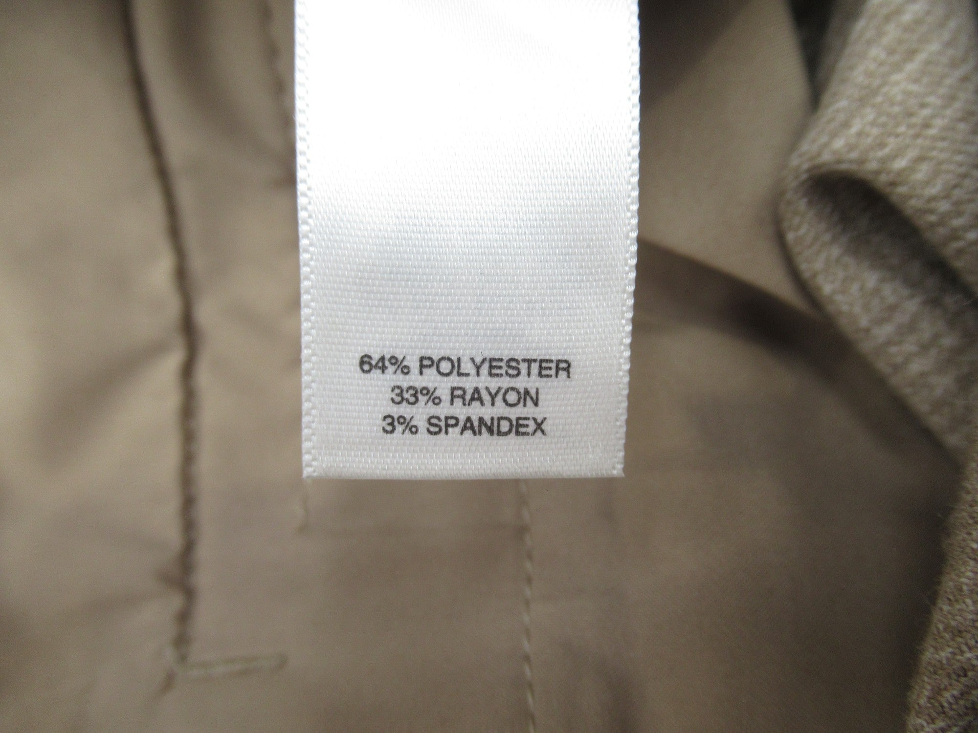 Care label image for White Black Small Beige Trouser Suit Womenswear | Preloved 