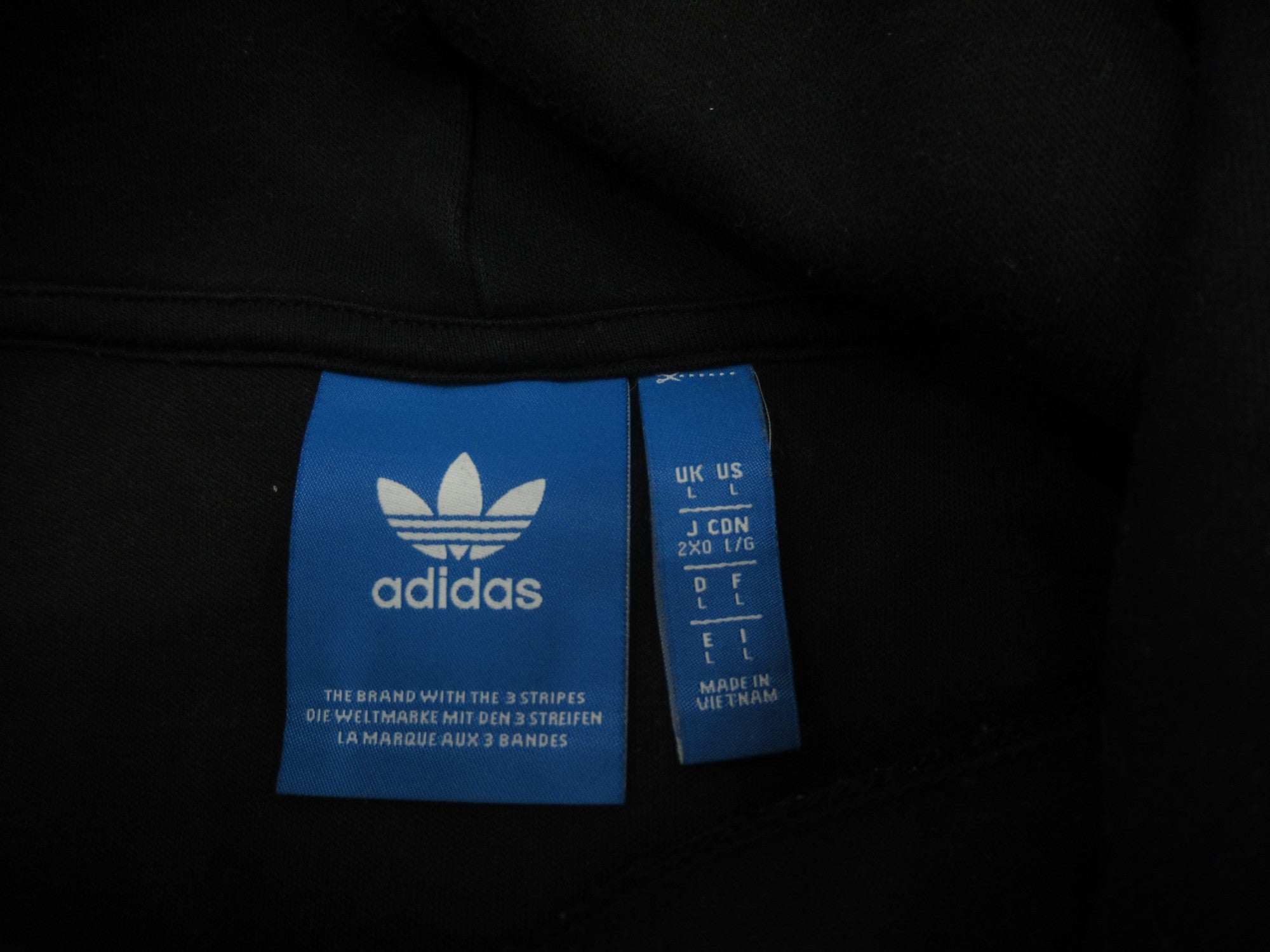 Size label image for Adidas Black White Large Hoodie Menswear | Preloved 