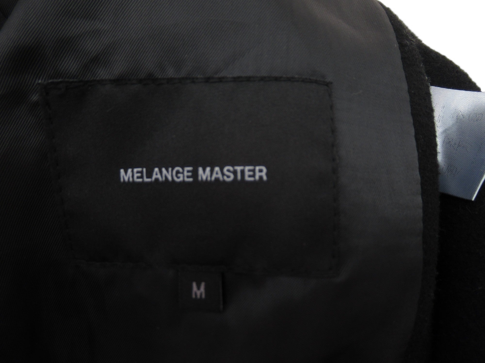 Brand label image for Melange Master Medium Black Duffle Coat Menswear | Preloved