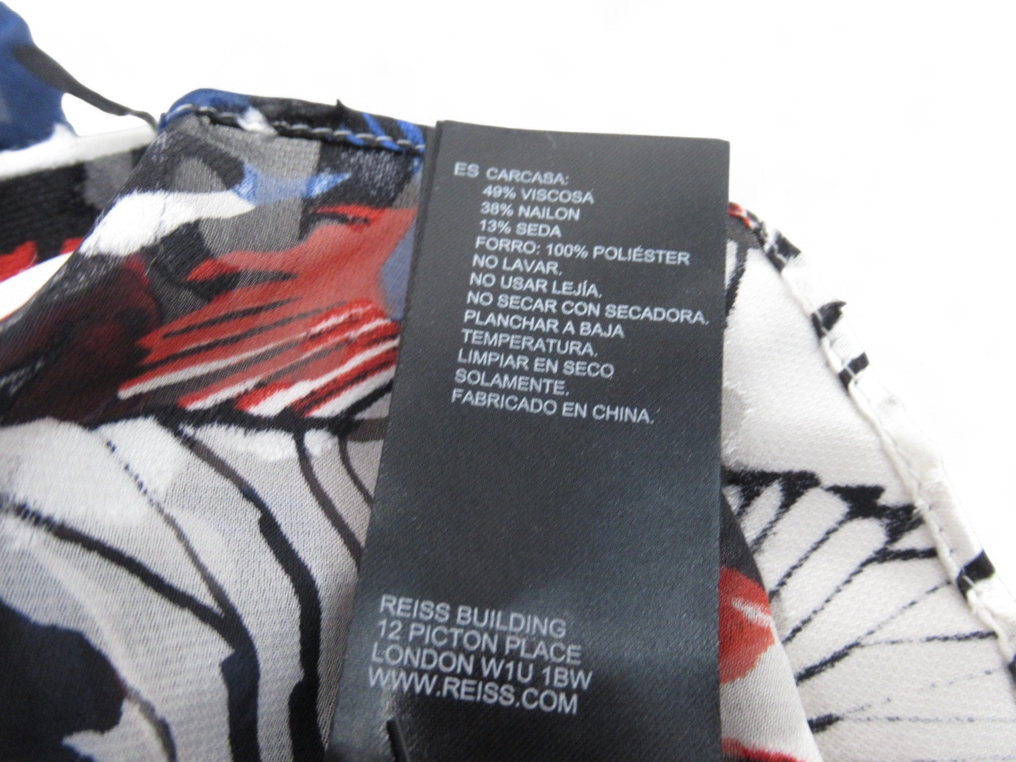 Care label image for Reiss UK 8 Multicoloured Print Asymmetric Dress Womenswear | Preloved 