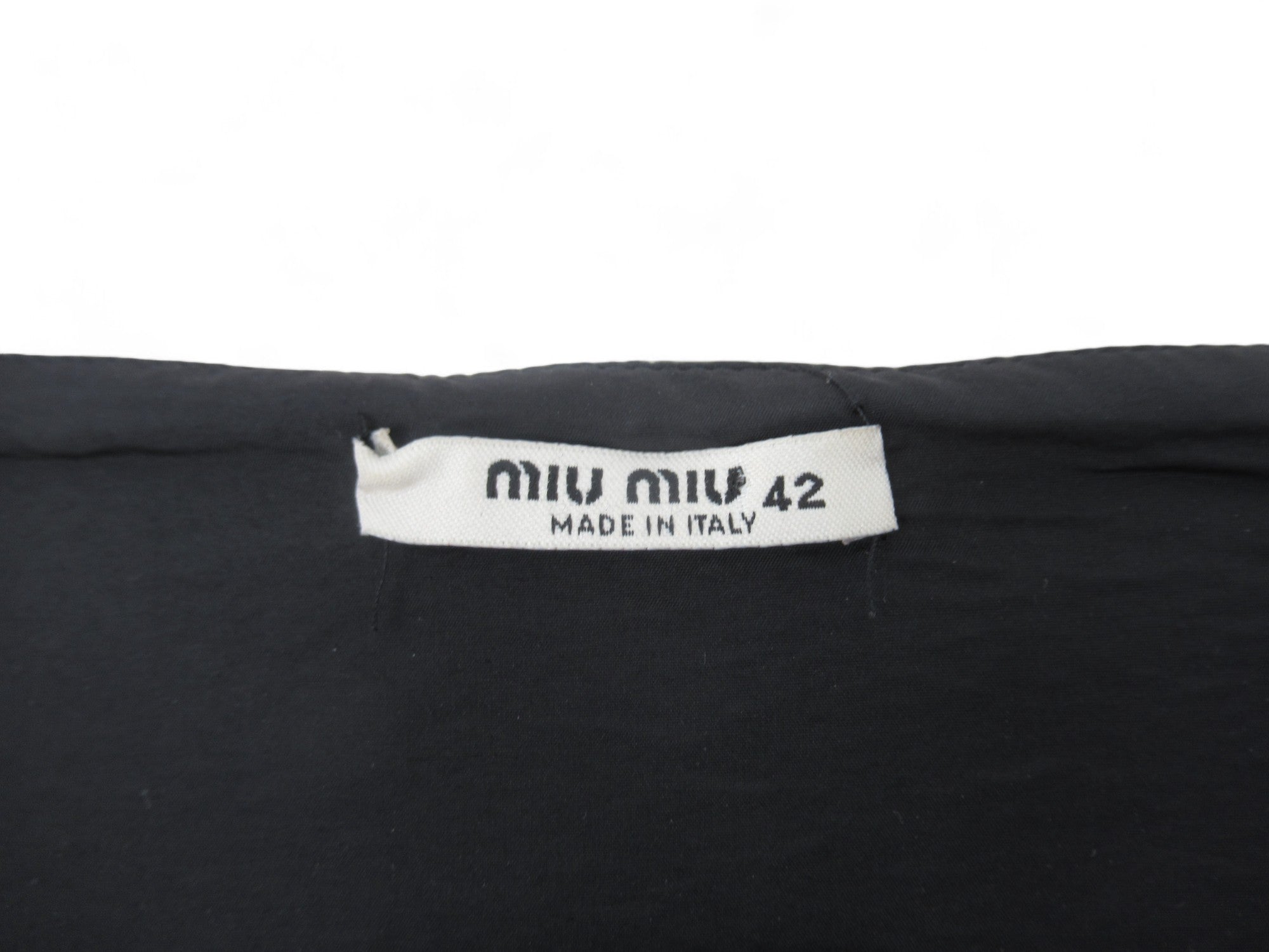 Brand label image for Miu Miu Medium Navy Mini Skirt Womenswear | Preloved