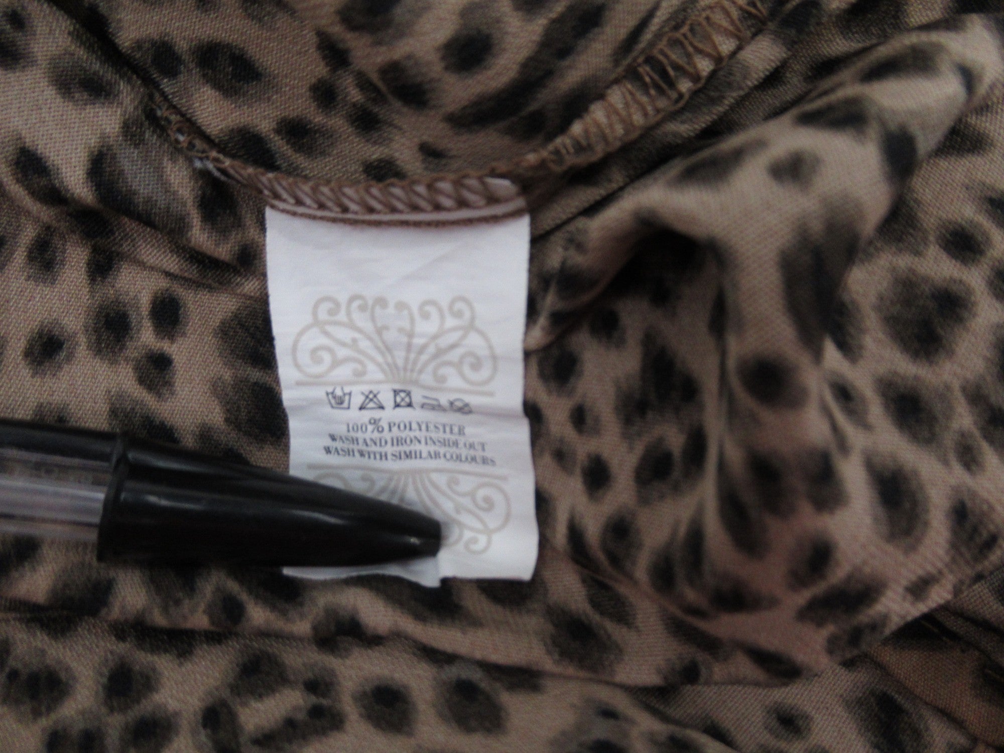 Care label image for Never Fully Dressed UK 6 Brown Maxi Dress Womenswear | Preloved 