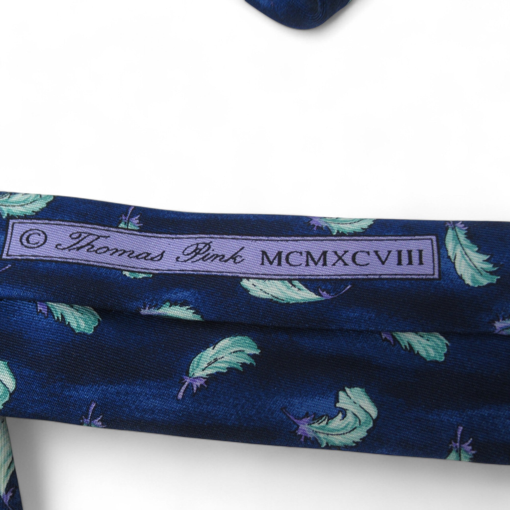 logo image for Thomas Pink Vintage Tie Blue Feather Silk Menswear | Preloved 