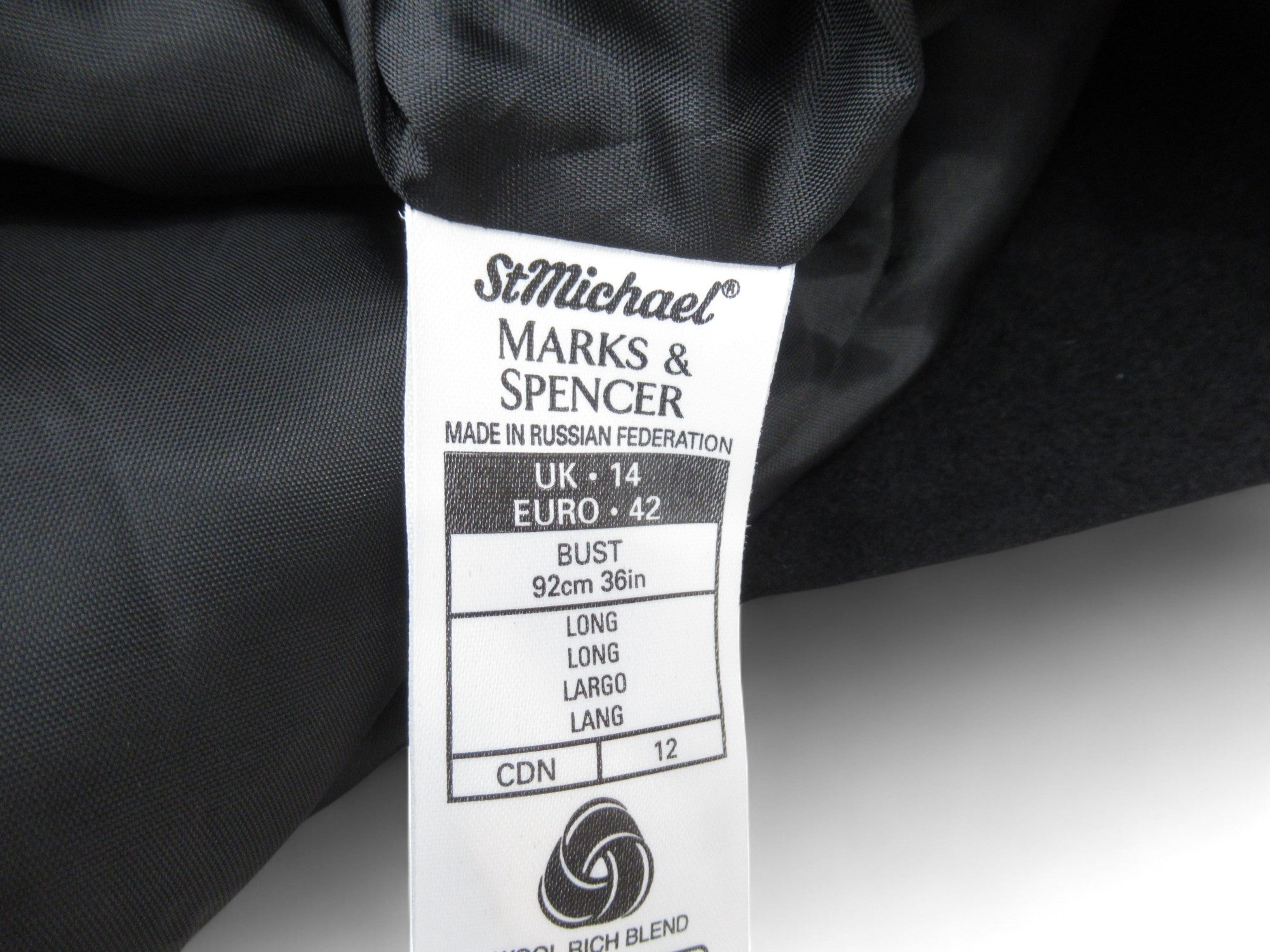 care label image for Marks & Spencers Overcoat UK14 Black Wool Womenswear | Preloved