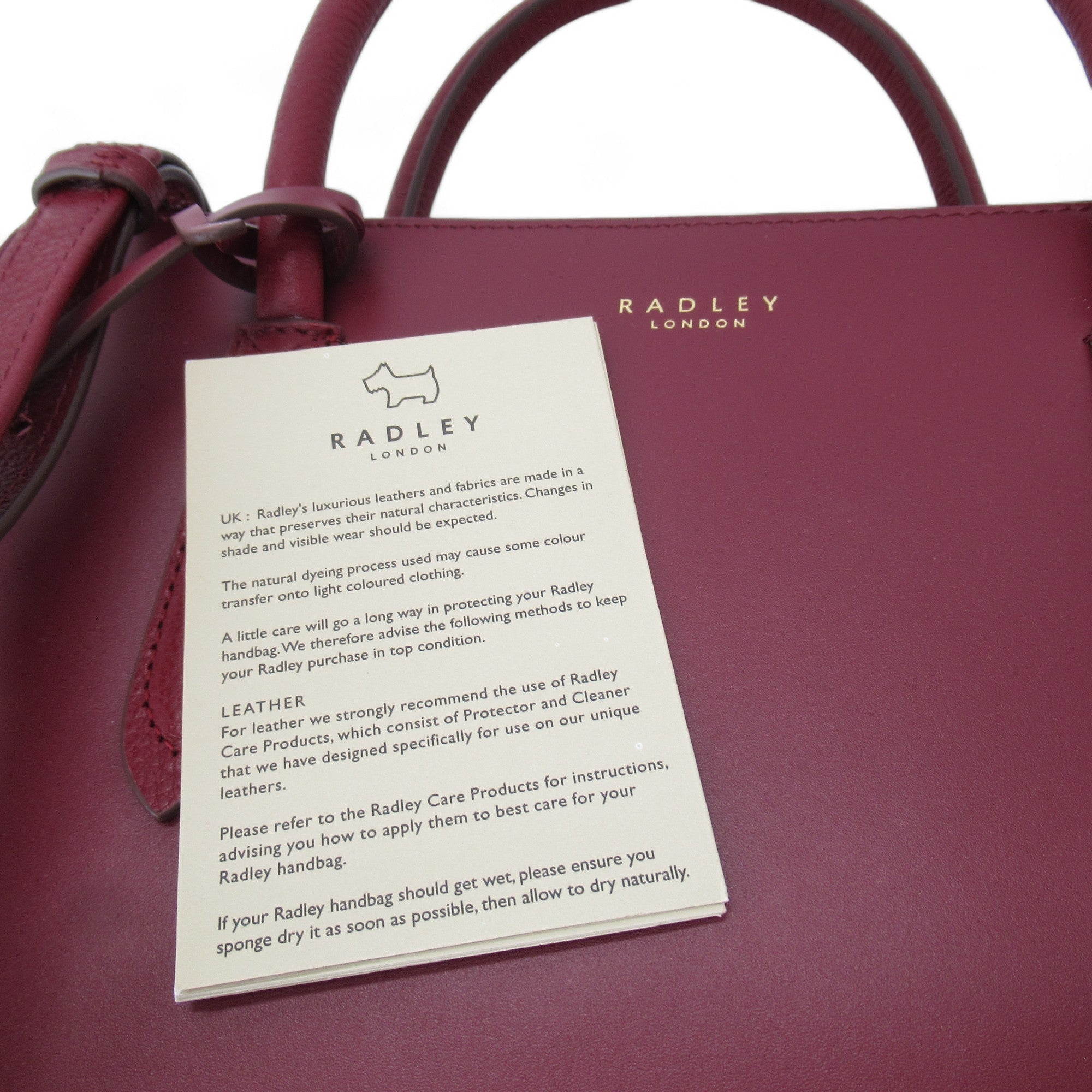 Care Label image for Radley Leather Handbag Medium Red Womenswear | Preloved