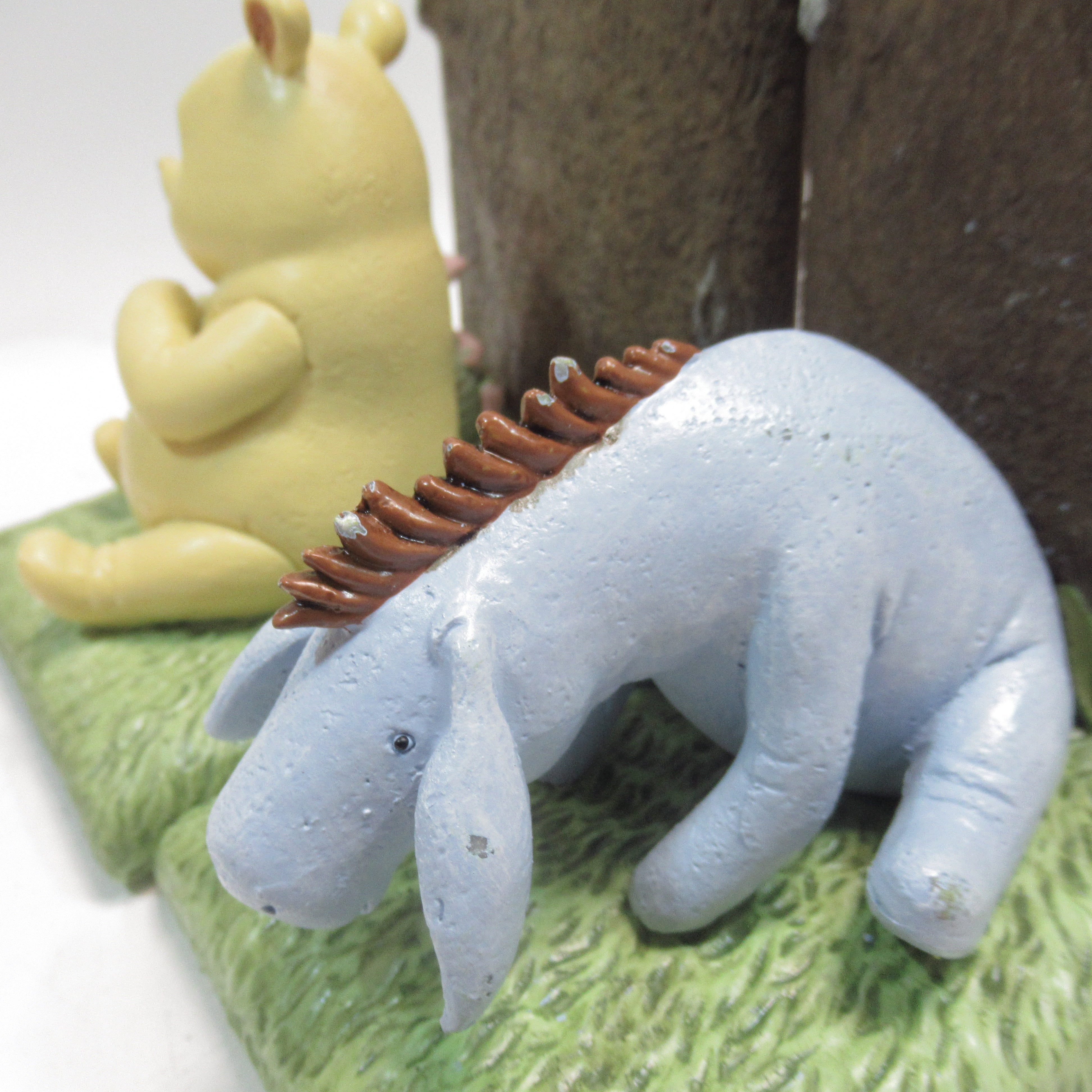 Close up showing wear to Eeyore Disney Winnie The Pooh & Eeyore Set of 2 Bookends