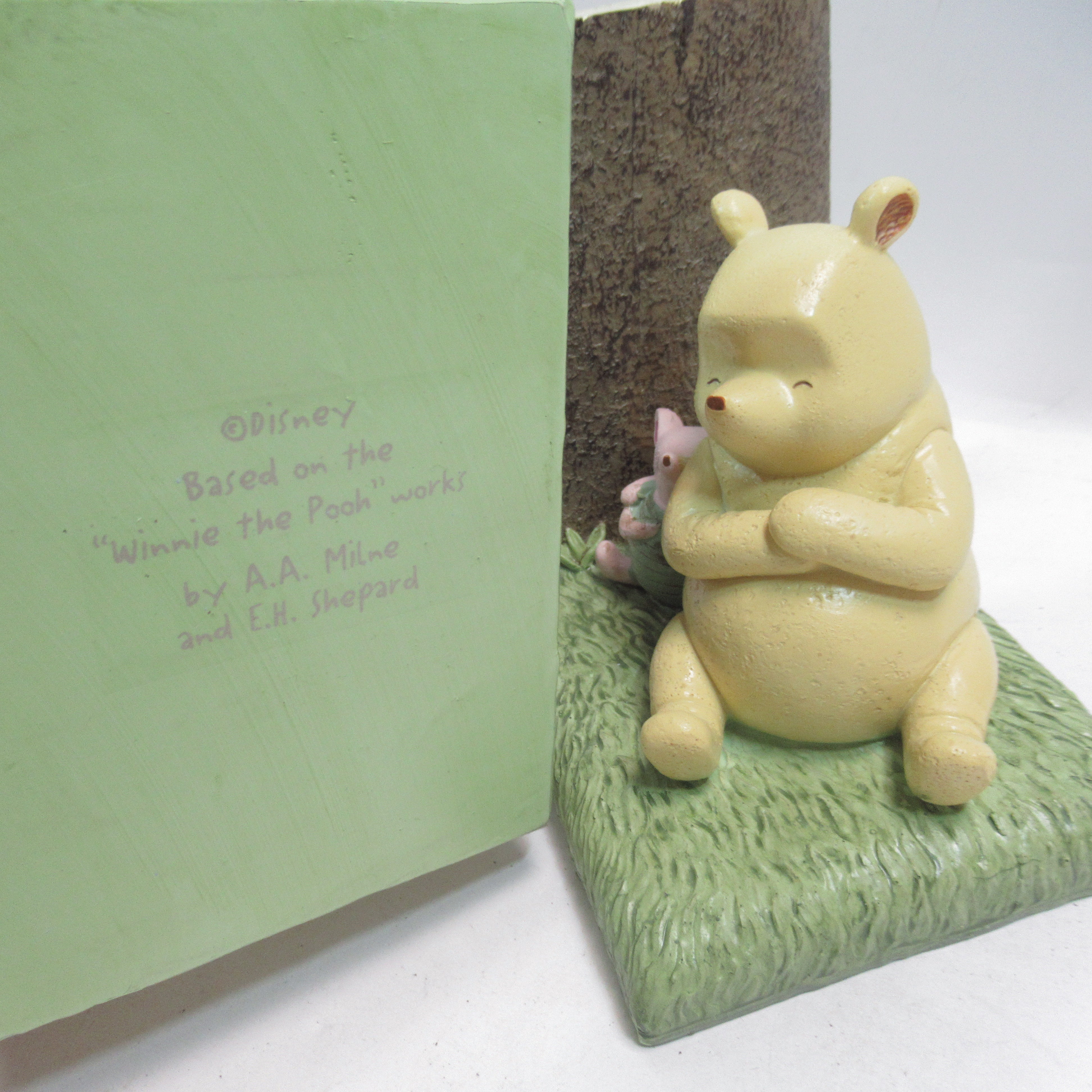 Close up of Pooh and underside of Disney Winnie The Pooh & Eeyore Set of 2 Bookends