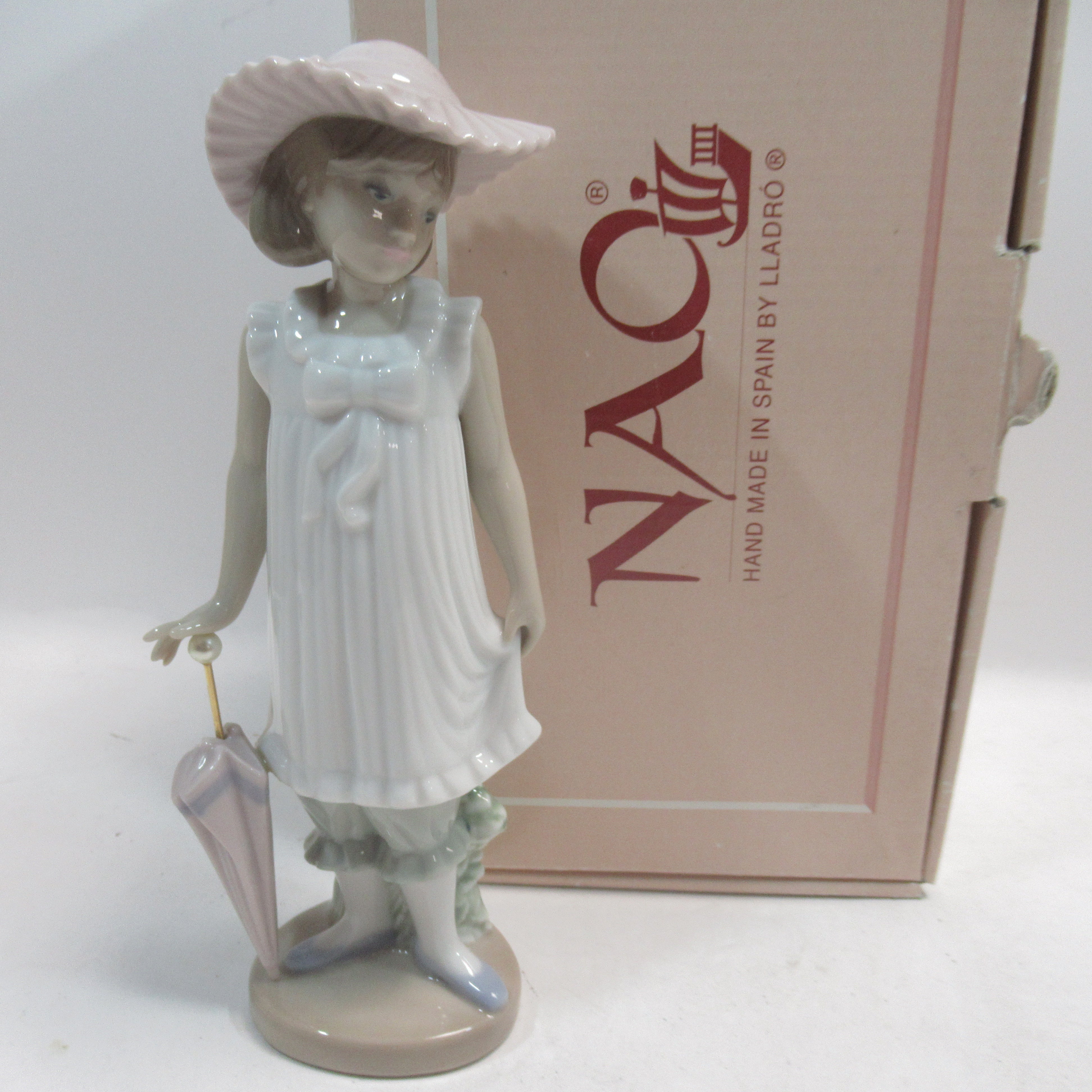 Front image of Nao Lladro April Showers Porcelain Figurine #1126