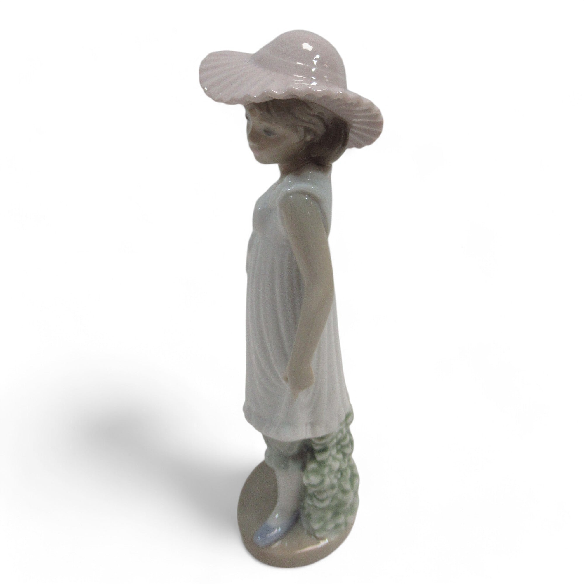 Right side image of Nao Lladro April Showers Porcelain Figurine #1126