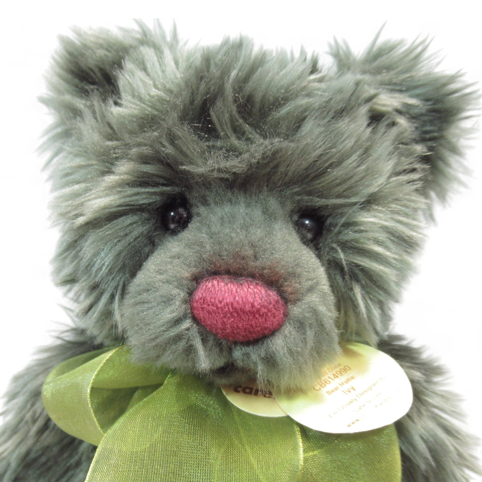 Close up face image of Charlie Bears Ivy Green Collectable Bear 30cm