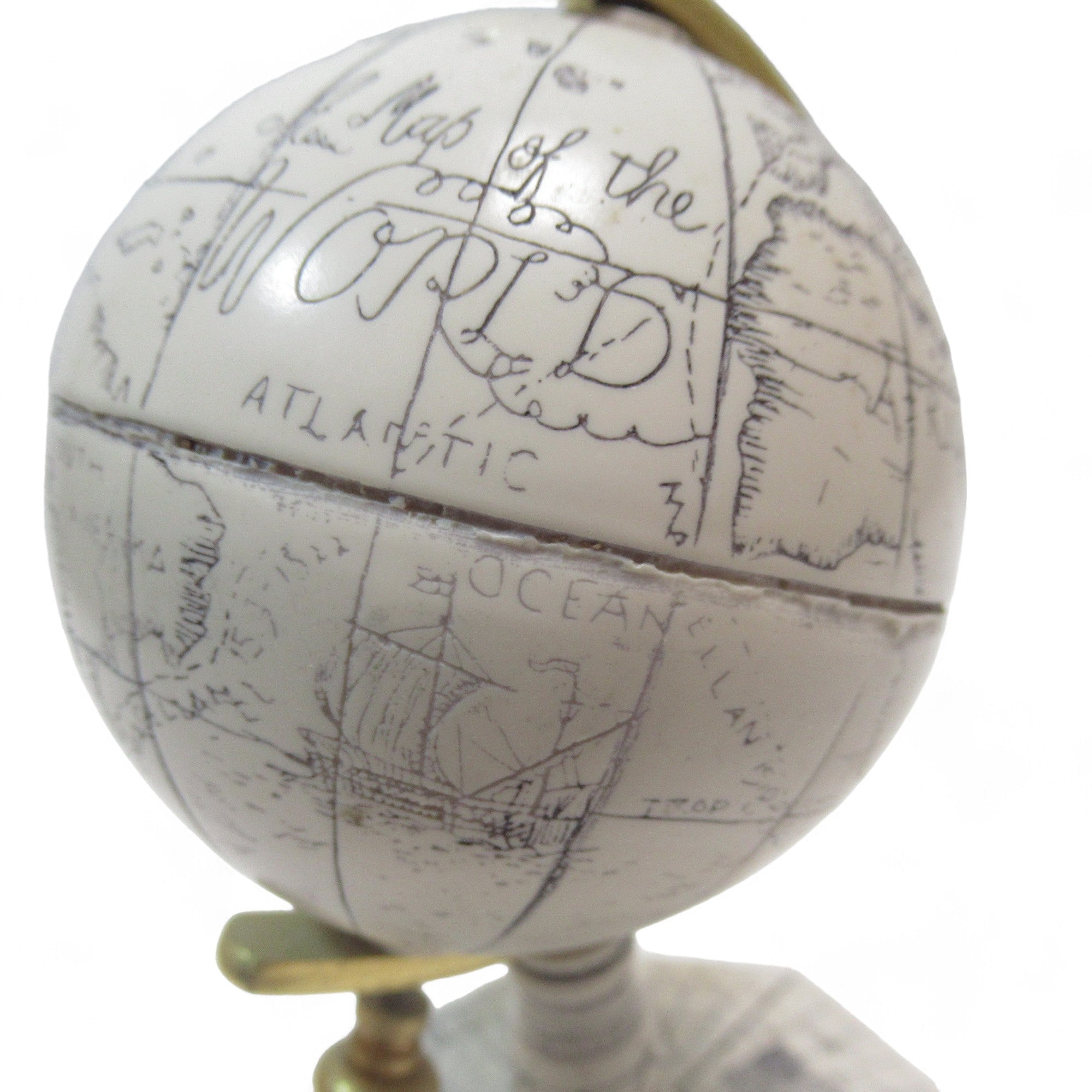 Close up image of Comoy's of London Faux Ivory Desk Globe