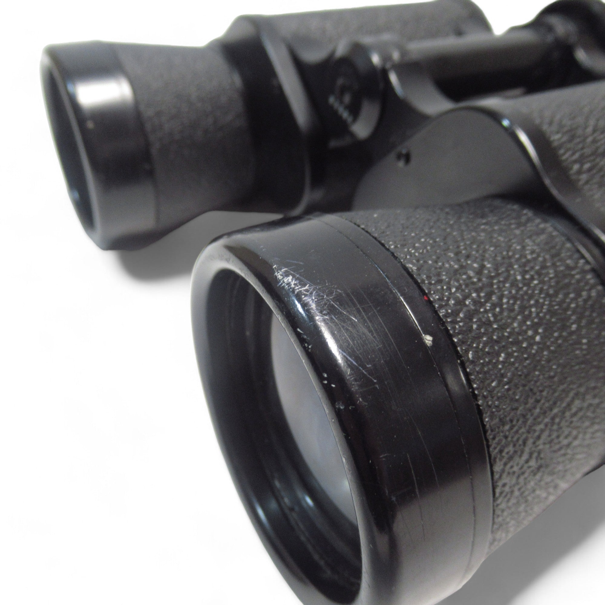 Close up wear image of Super Zenith 10X50 Full-Size Binoculars Black w/ Case