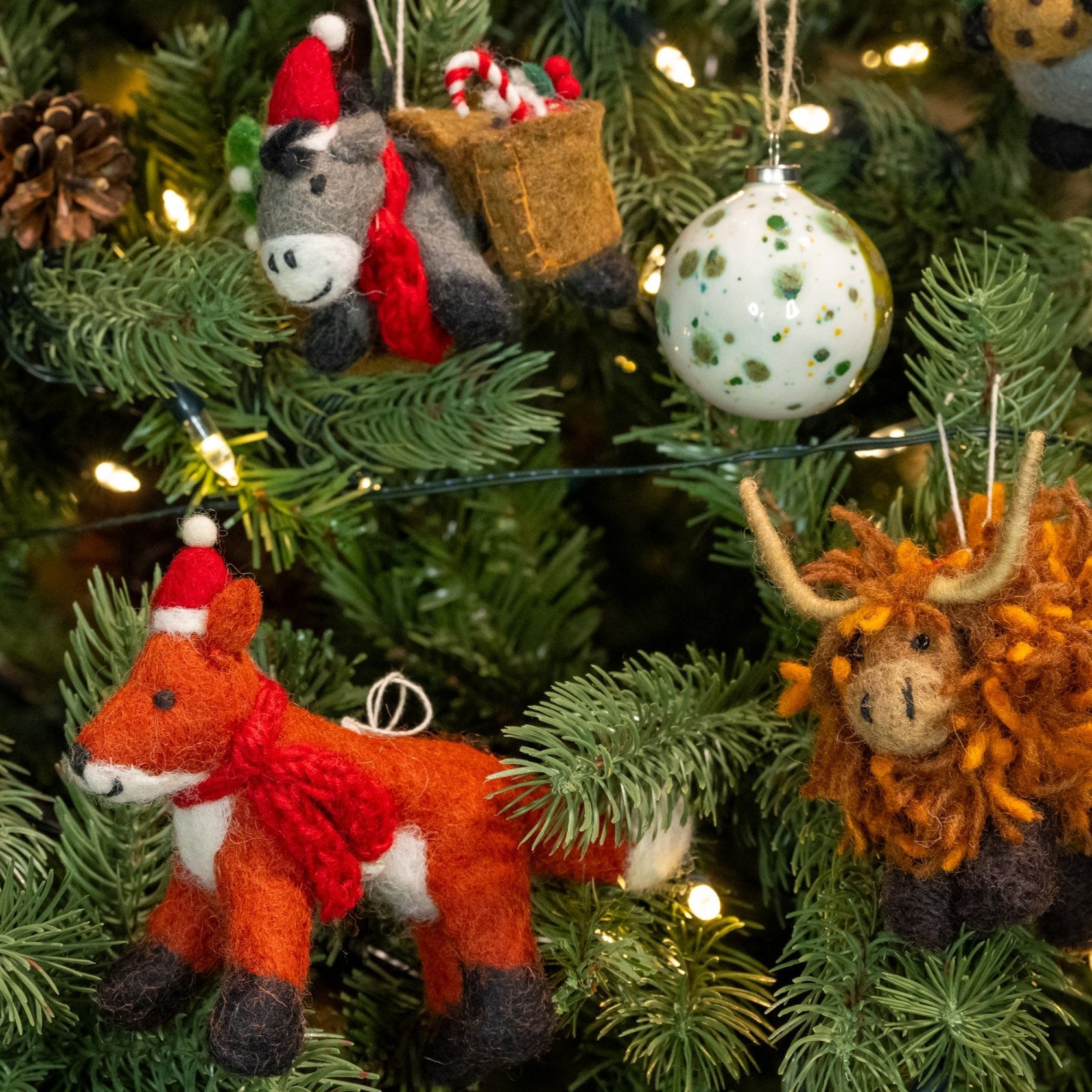 Christmas tree with Fox with Hat  and other decorations and baubles