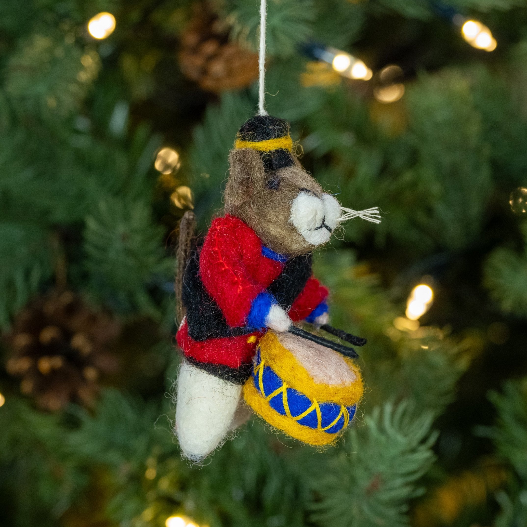 Side image of Drummer mouse drumming handmade felt Christmas decoration