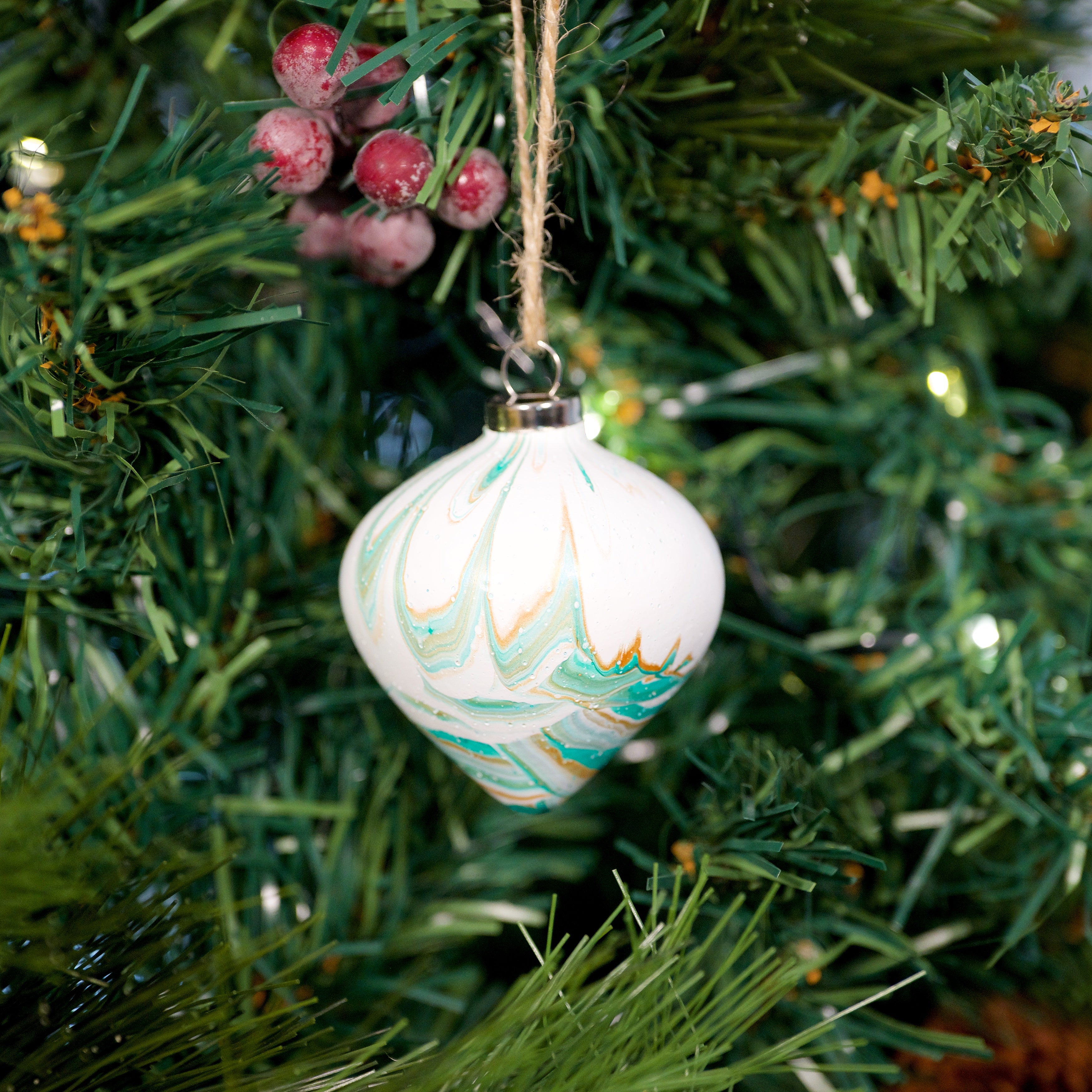 Designed by Refugees 'Happiness' White & Green Hand Painted Ceramic Bauble - Diamond Shape